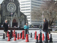 Copyright: New Zealand Tourism Guide. Playing Chess in front of the Cathedral in Christchurch