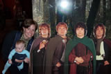Taking a photo with hobbits on our New Zealand South Island holiday tours