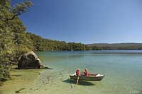 Image Source: Tourism New Zealand. Rowing At Lake Waikareiti, Eastland, New Zealand