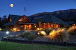 Alpine Lodge lit up at night in St Arnaud