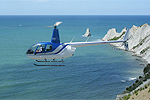 A Bay Heliwork Helicopter flying in the Hawke's Bay