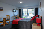 A bedroom at Central Gold Motel