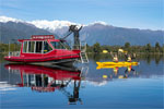 View more images of FRANZ JOSEF WILDERNESS TOURS - Franz Josef Kayaking on a crystal clear lake