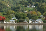 Looking across the lake to Lake Whakamarino Lodge