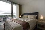 View more images of PROXIMITY APARTMENTS - Auckland A bedroom at the Proximity Apartments