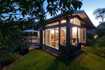 Stone Store Lodge in Kerikeri lit up at night