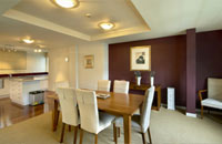 Dining room and kitchen at The Glebe Luxury Apartments