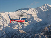 Flying above the mountains with The Helicopter Line