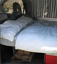 Bed inside a campervan from CamperCo, our campervan rental in Nelson