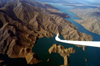 Image Source: Tourism New Zealand. Gliding over Lake Benmore, Central Otago, New Zealand