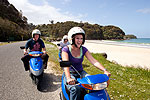 Riding scooters on Stewart Island